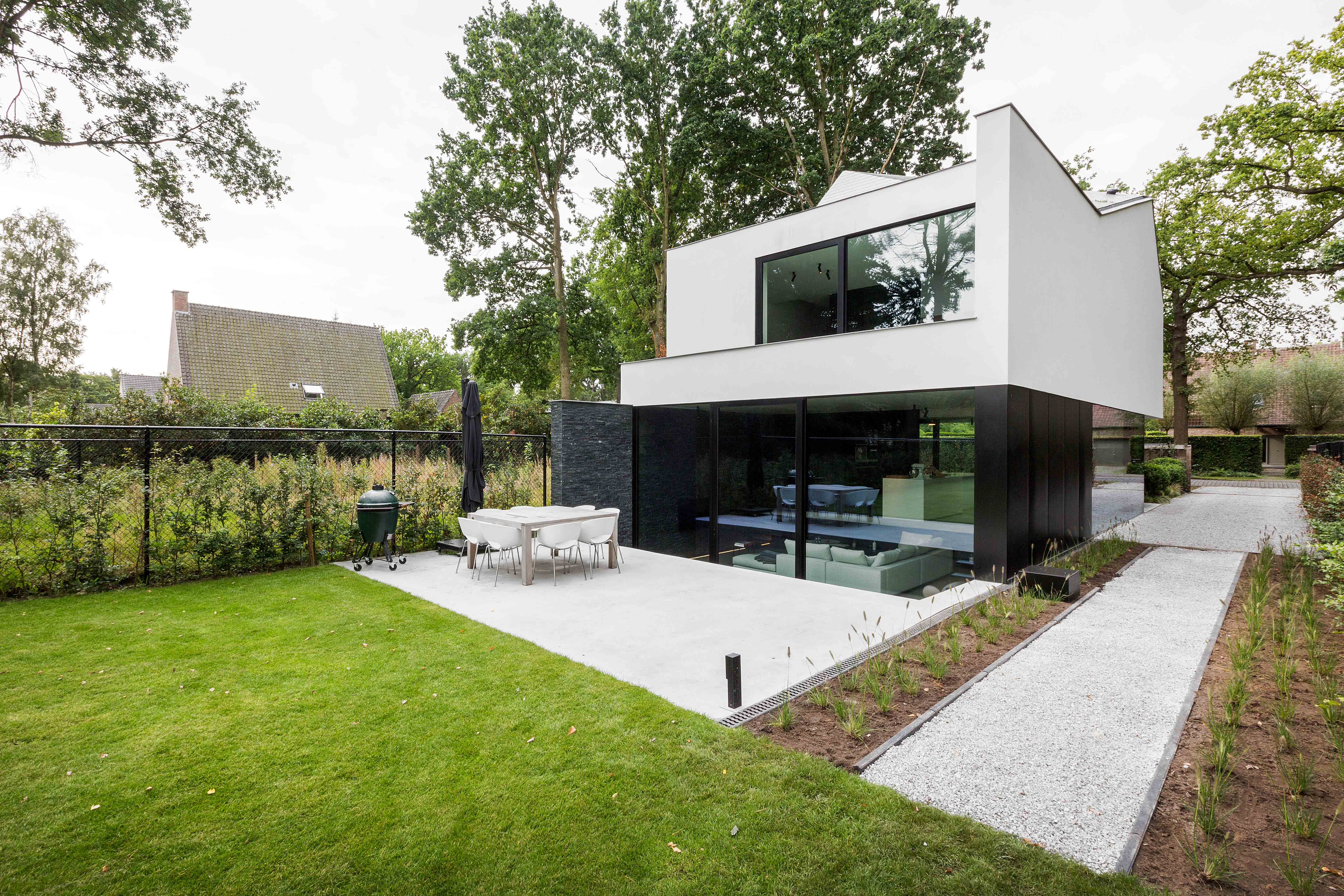 moderne strakke hob crepi brasschaat sandwichpanelen kingspan icoon architecten
